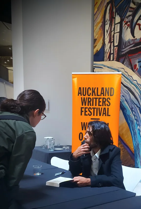 Behrouz Boochani book-signing at the Auckland Writers Festival, 2021