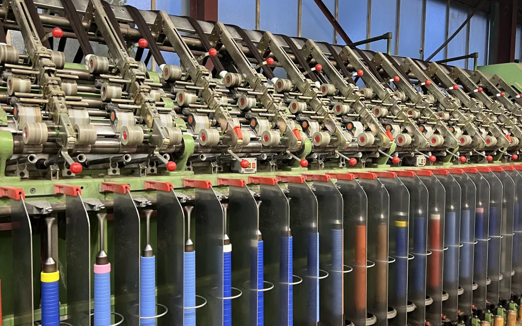 Canterbury's Wild Earth Yarns is committed to processing wool in New Zealand. It's bought the woollen dye house and spinning mill of Napier company Design Spun which is closing. Yarn from Wild Earth Yarn's factory in the Christchurch suburb of Bromley will be used in textiles, knitting and socks.