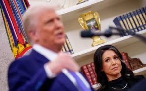WASHINGTON, DC - FEBRUARY 12: U.S. President Donald Trump, accompanied by Tulsi Gabbard, speaks after Gabbard is sworn in as director of national intelligence in the Oval Office at the White House on February 12, 2025 in Washington, DC. Gabbard, who will oversee the 18 intelligence agencies and serve as Trump's advisory on intelligence, was confirmed by the Senate 52-48. Andrew Harnik/Getty Images/AFP (Photo by Andrew Harnik / GETTY IMAGES NORTH AMERICA / Getty Images via AFP)