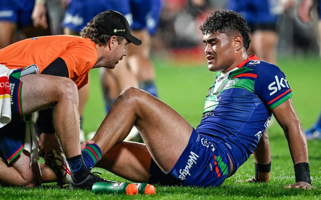 Jacob Laban of the Warriors receives medical attention, NZ Warriors v Dolphins.