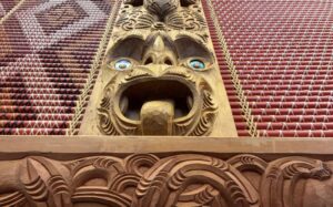 Tukutuku panel and carving inside Parliament's Māori Affairs Select Committee room, Māui Tikitiki-a-Taranga.
