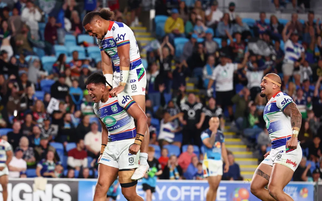 Eddie Ieremia-Toeava of the Warriors celebrates scoring a try v Gold Coast Titans.