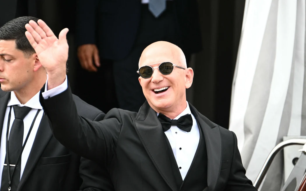 Amazon's founder Jeff Bezos leaves the Aman Hotel on his wedding day in Venice on June 27, 2025. (Photo by Stefano Rellandini / AFP)
