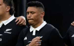 An emotional Caleb Clarke as his father and Ex-All Blacks Eroni Clarke sings the national anthem before the - New Zealand All Blacks v Australia, 2025 Rugby Championship test match at Eden Park - Auckland - New Zealand on Saturday 27 September 2025 Photo credit: Brett Phibbs / www.photosport.nz