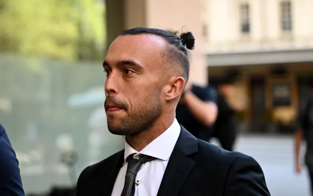 Former New Zealand international soccer player Clayton Lewis arrives at the John Maddison Tower court building, in Sydney, Wednesday, September 17, 2025. Macarthur FC captain Ulises Davila's co-accused Kearyn Baccus and Clayton Lewis face sentencing for alleged betting corruption. (AAP Image/Dan Himbrechts/ Photosport)