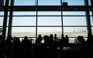 Low fog delays and cancels flights at Wellington Airport Tues 21st Jan 2020. View of fog through Wellington Aiport windows.