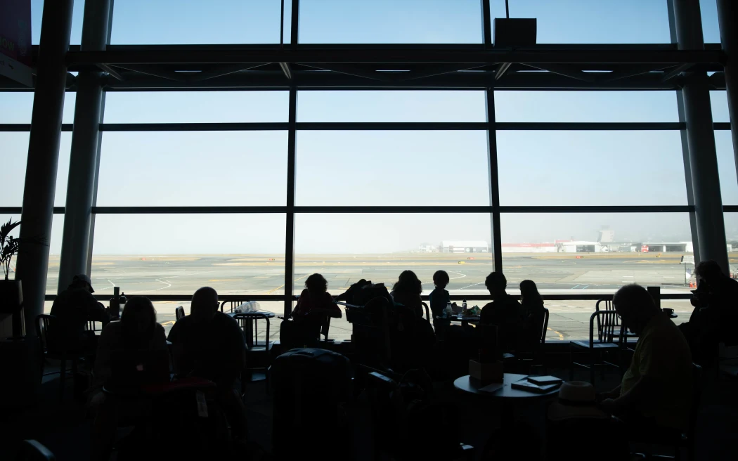 Low fog delays and cancels flights at Wellington Airport Tues 21st Jan 2020. View of fog through Wellington Aiport windows.