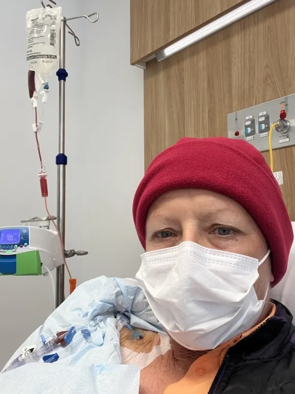 Jo Neep receiving a stem cell transplant in 2022.