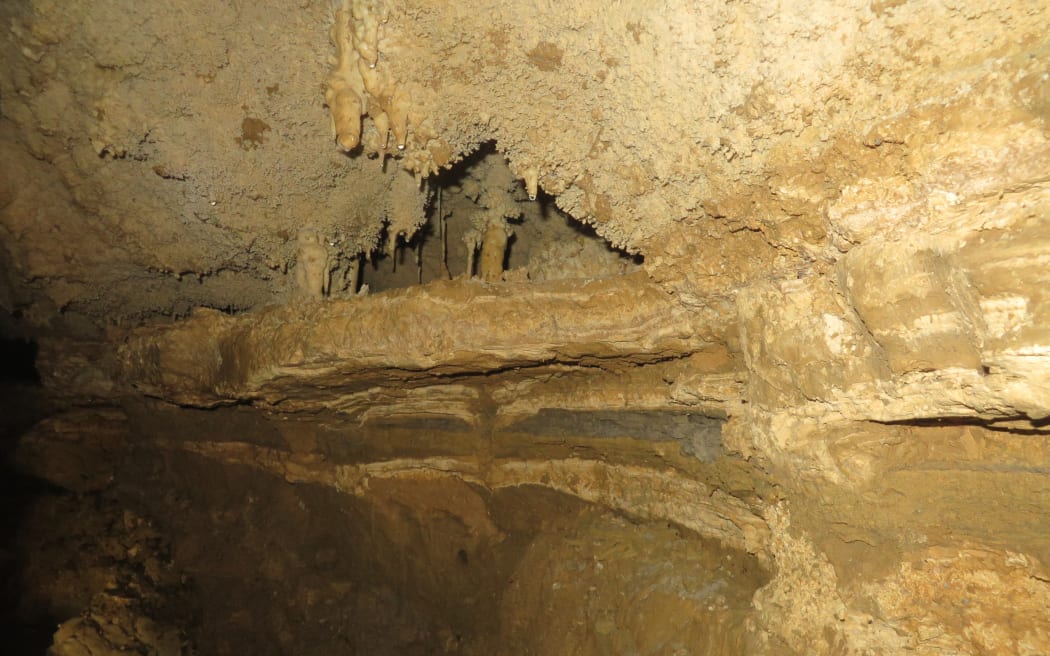 Layers of ash in underground caves show the impact and scale of New Zealand's volcanic eruptions.