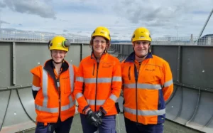 Mercury's Lexi Richards, Aimee McGregor and Matt Kedian on the roof of the new unit.