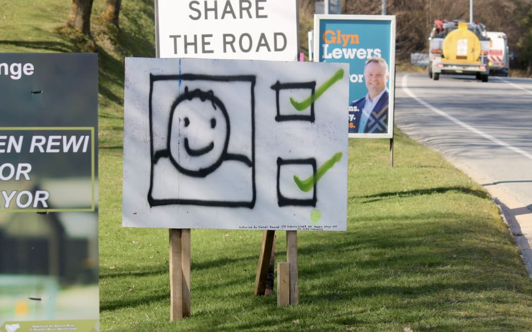 One of Daniel Shand's mysterious signs on Frankton Road, Queenstown.