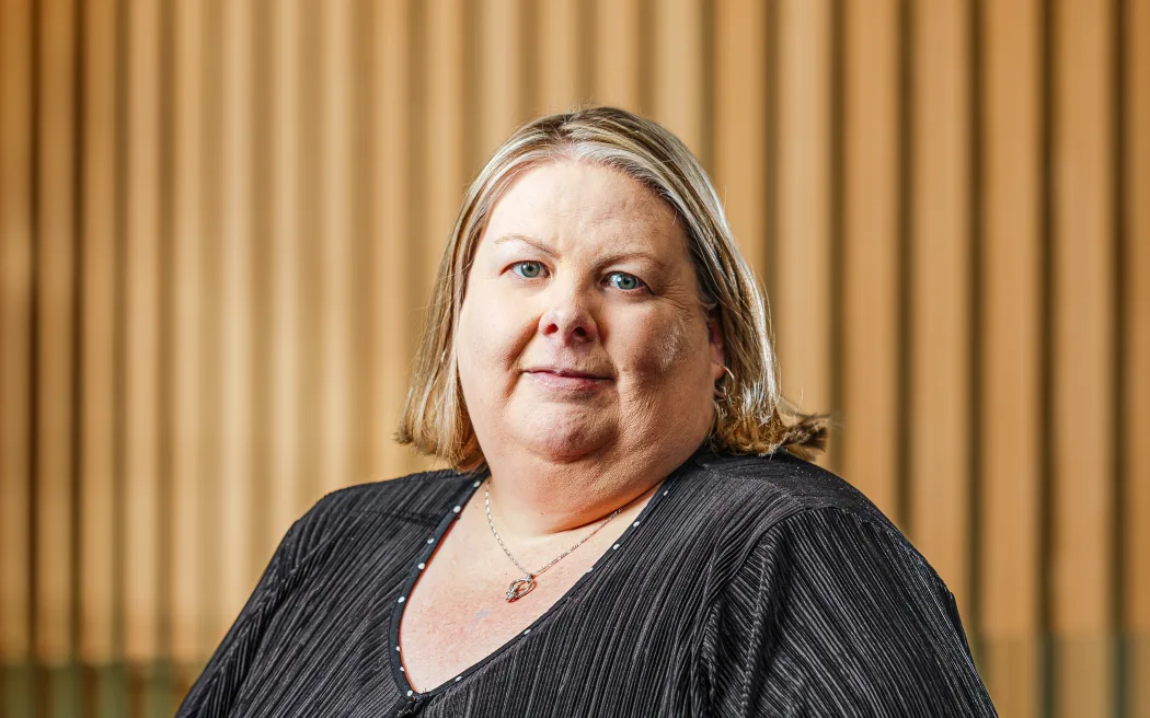 A head-and-shoulders professional photo of Nicolette Dickson