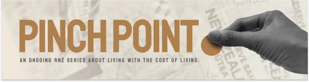 Chăm sóc răng miệng: Vòng luẩn quẩn đắt đỏ khiến nhiều người lao đao 4 Pinch point: an ongoing RNZ series about living with the cost of living. Hand pinching coin. Bank notes in background.