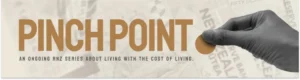 Pinch point: an ongoing RNZ series about living with the cost of living. Hand pinching coin. Bank notes in background.