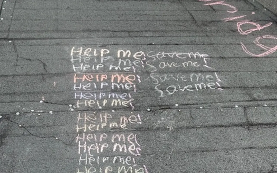 Protestors wrote messages on the bridge, once they had taken down the fences to access it, on 13 September, 2025.