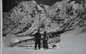 Sir Edmund Hillary (left) was one of the earliest passengers aboard Sir Harry Wigley’s first glacier flights on 22 September, 1955.