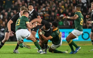 South Africa Springboks v New Zealand All Blacks, Ellis Park, Johannesburg, 2024. Caleb Clarke is tackled.