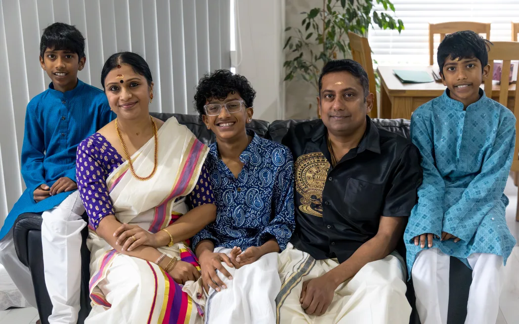 Sreekanth Vidyadharan (second from right) with Dhanya Sreekanth and their children Jagan (middle) and twins Darshan and Devan at their Auckland home.