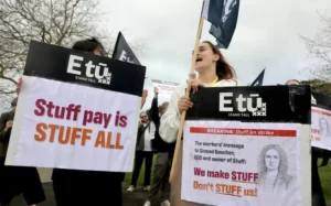 Staff at Stuff in Auckland are striking over low pay offers and what they say are attempts to divide the workforce. 28 August 2025