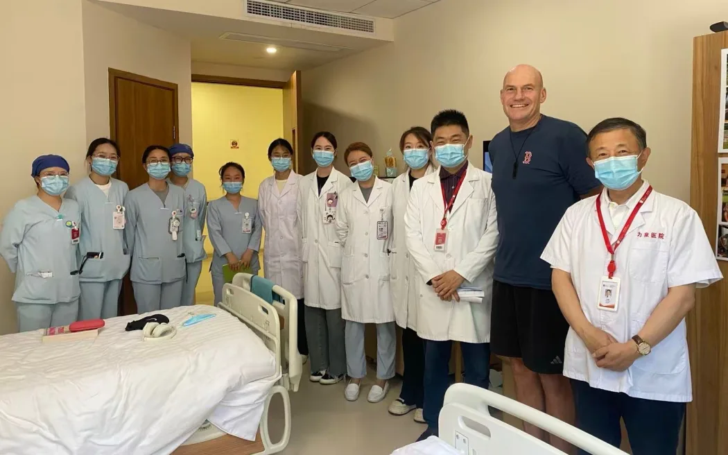 Stu Lye with hospital staff in China where he underwent CAR T-cell therapy.