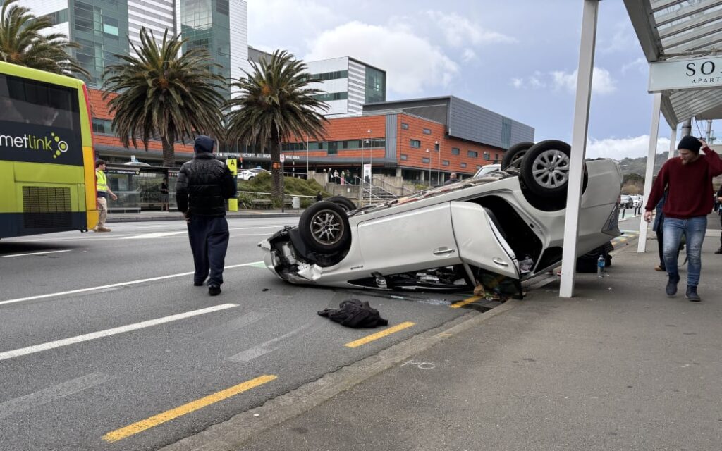 A Toyota Prius on its roof after a crash with a VW Golf outside Wellington Hospital.