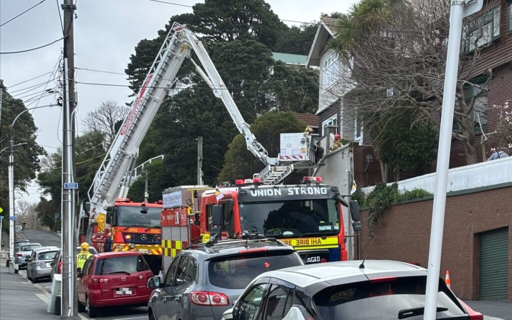 The Fire Service looking at a property on The Terrace in Wellington damaged by high winds.