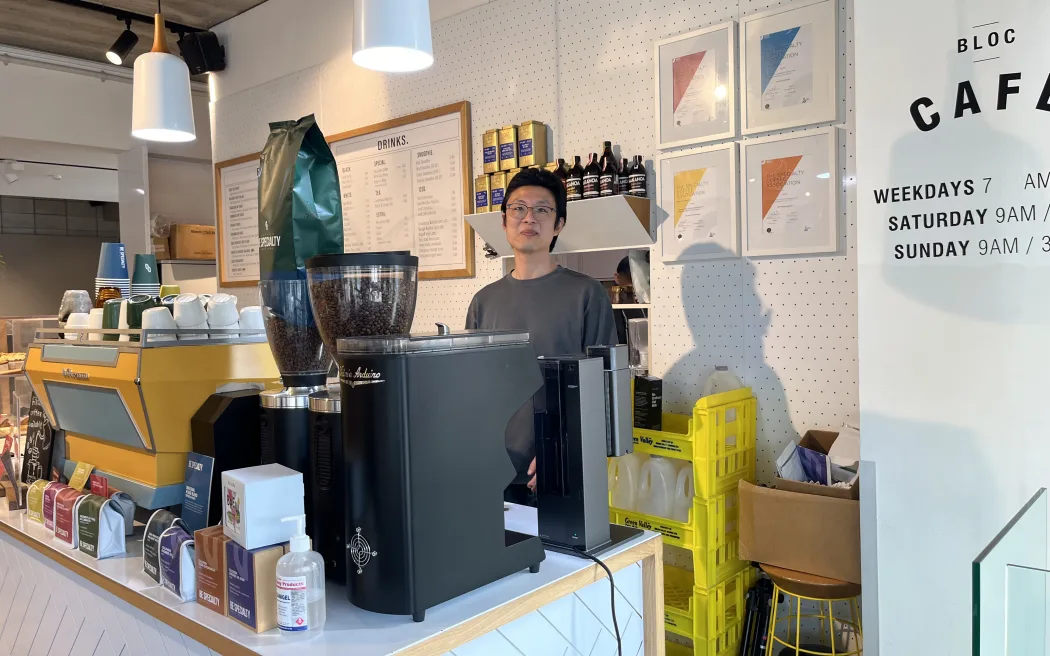 Yanjie Gu, owner of BLOC Café, says building good relationships with customers is key to running a café in New Zealand.
