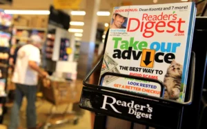 SAN ANSELMO, CA - AUGUST 17: A copy of Reader's Digest magazine is displayed on a rack at a grocery store August 17, 2009 in San Anselmo, California. Citing weak advertising revenue, the publisher of Reader's Digest announced today that it will file a pre-arranged Chapter 11 bankruptcy and plans to swap nearly $1.6 billion in debt for partial ownership of the company. Justin Sullivan/Getty Images/AFP (Photo by JUSTIN SULLIVAN / GETTY IMAGES NORTH AMERICA / Getty Images via AFP)