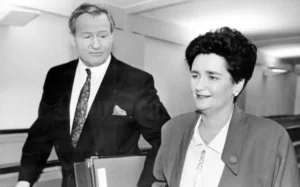 Prime Minister Jim Bolger and Finance Minister Ruth Richardson make their way to the House of Representatives for the presentation of the 1991 budget
