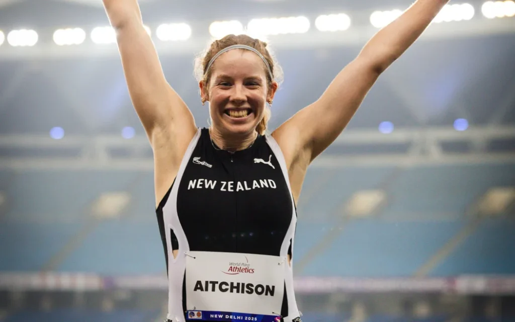 Danielle Aitchison celebrates winning gold for New Zealand in the 100m T36 final at the 2025 World Para Athletics Championships in New Delhi.