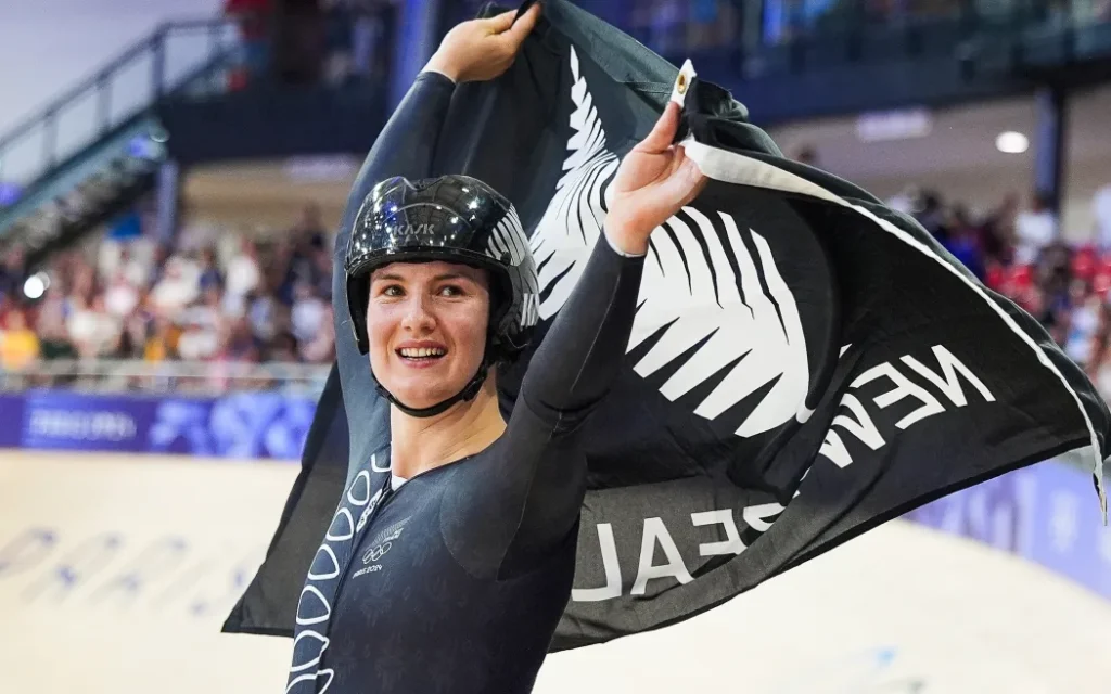 Picture by Zac Williams/SWpix.com - 11/08/2024 - Paris 2024 Olympic Games - Track Cycling - National Velodrome, Saint-Quentin-en-Yvelines, France - Women’s Sprint Final for Gold - Ellesse Andrews (New Zealand) celebrates winning the Women's Sprint to become Olympic Champion
