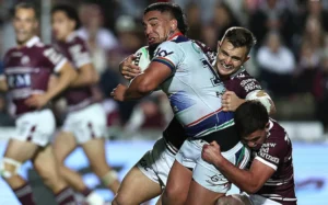 Erin Clark of the Warriors in action against the Manly Sea Eagles.