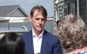 Deputy Mayor Jonathan Larsen, and current front runner in the mayoral race with a margin of just five votes, addresses the media.
