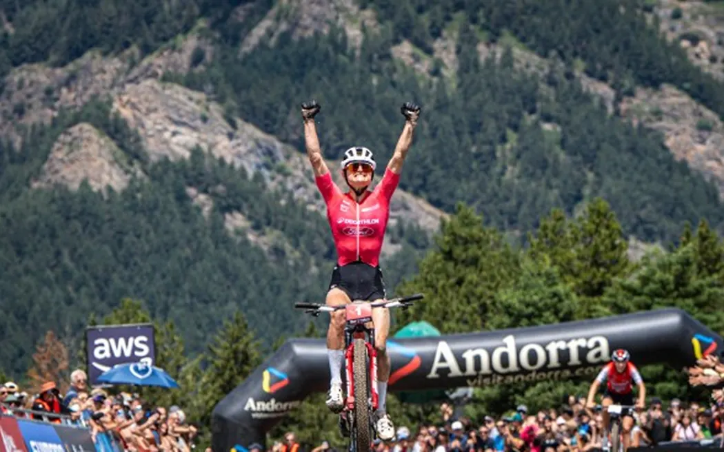 New Zealand mountainbiker Sammie Maxwell celebrates victory in a UCI cross-country event at Pal Arinsal, Andorra, 14 July, 2025. (Credit: Decathlon Ford Racing)
