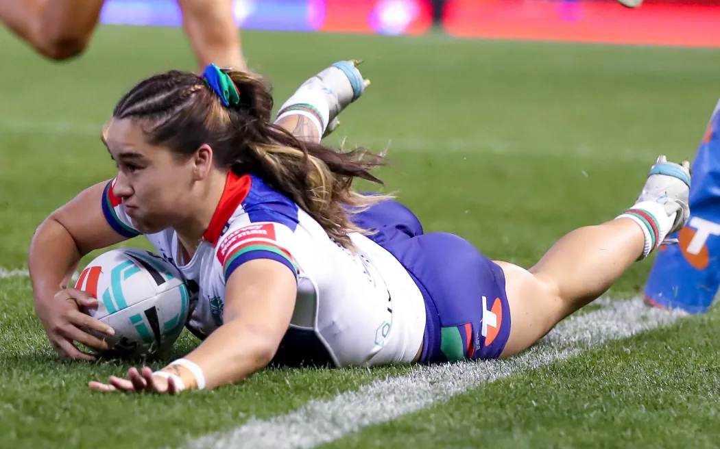 Payton Takimoana scores for the Warriors against the Newcastle Knights in their NRLW clash.