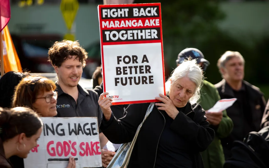 About 200 people have gathered outside Resene's head office in Lower Hutt to protest for a living wage.
