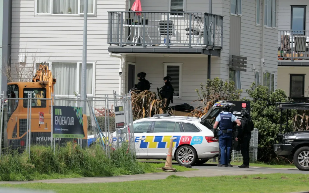 Police said they were called to Flat Bush just about 9.30am, and a gun was fired at police.