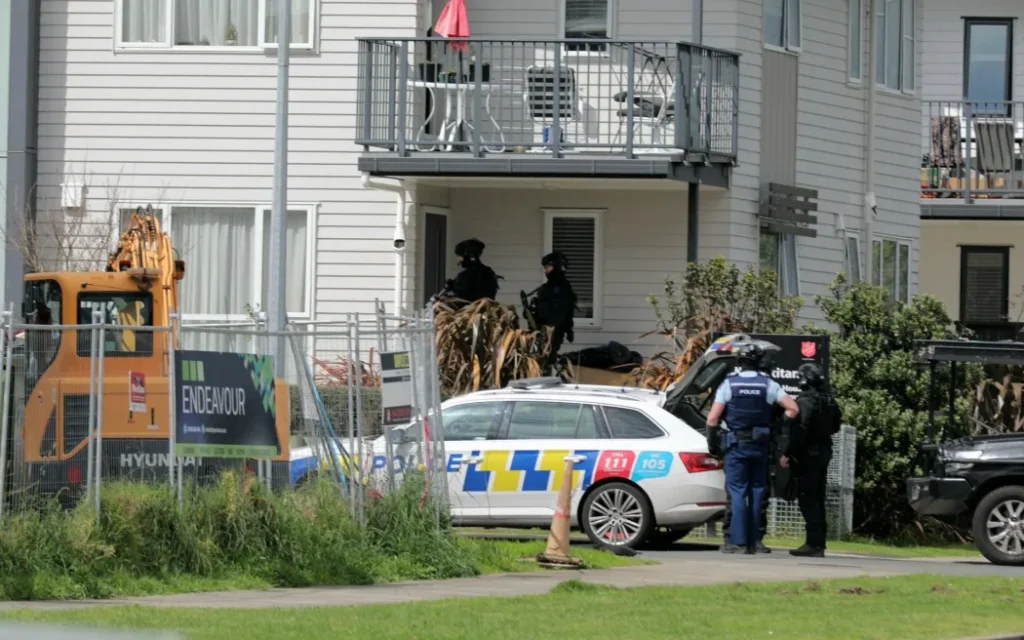 Police said they were called to Flat Bush just about 9.30am, and a gun was fired at police.