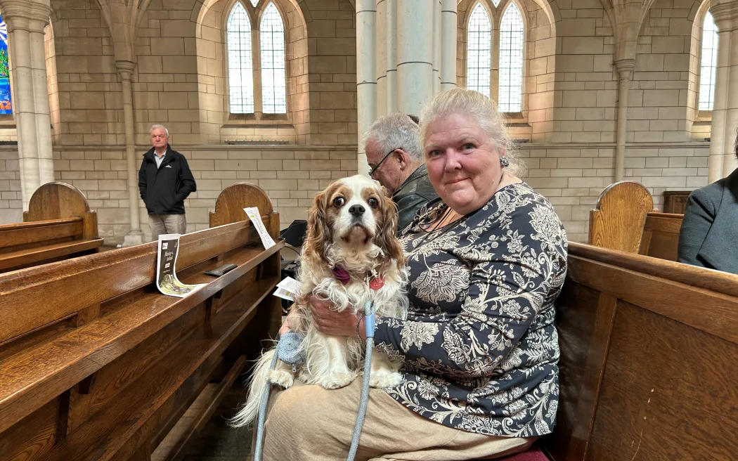 Portrait of a woman and her dog.