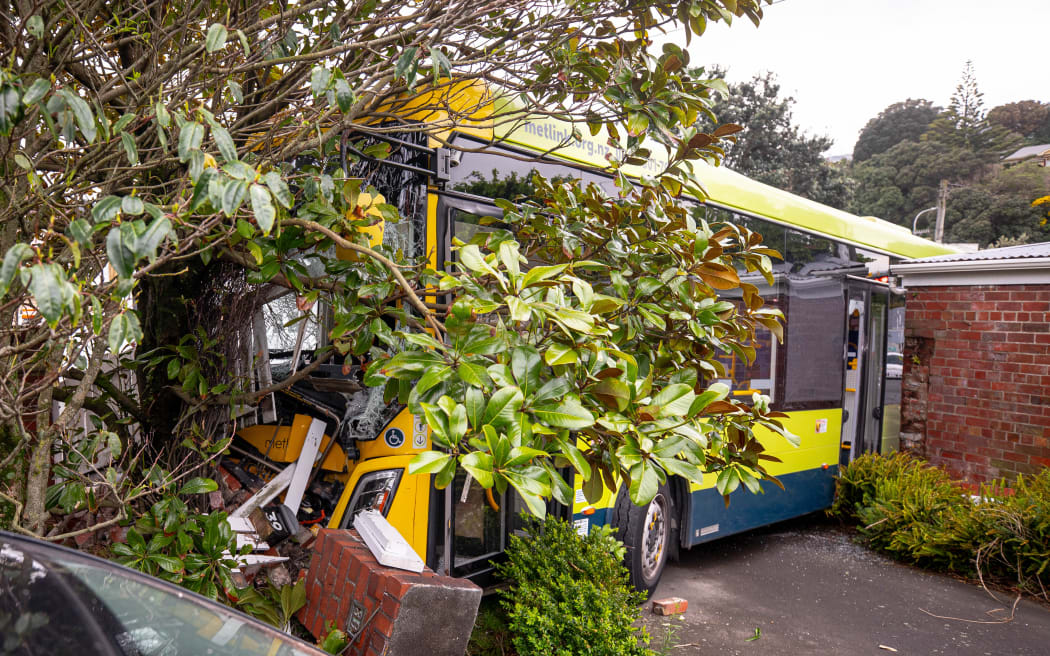The Metlink bus crashed through home's fence, closing lane on major Wellington road, 6 October 2025.