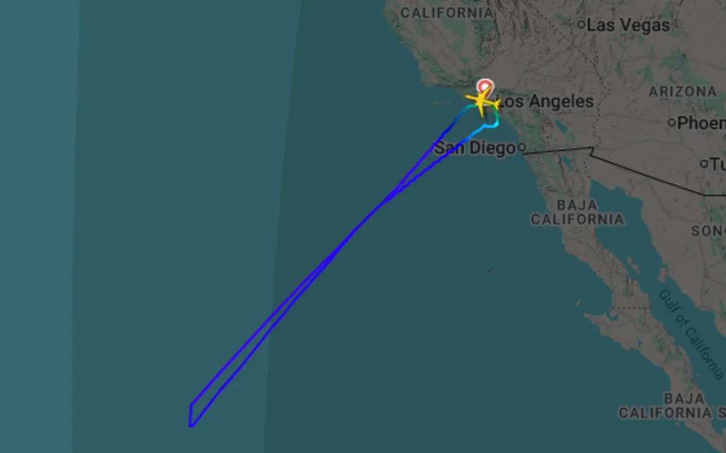 The plane turned back to Los Angeles shortly after takeoff.