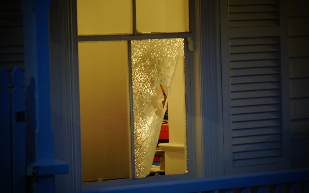 The smashed window.