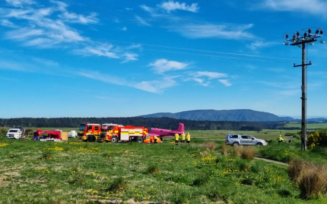 A number of helicopters with monsoon buckets and planes are fighting the blaze. The planes are landing at an airstrip not far from the fire where they appear to be pumped full of with water to drop.