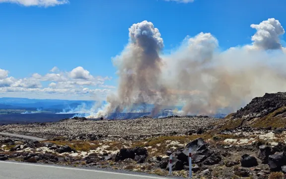 A view of plumes of smoke billowing from the fire in the Tongariro National Park, taken from Bruce road.