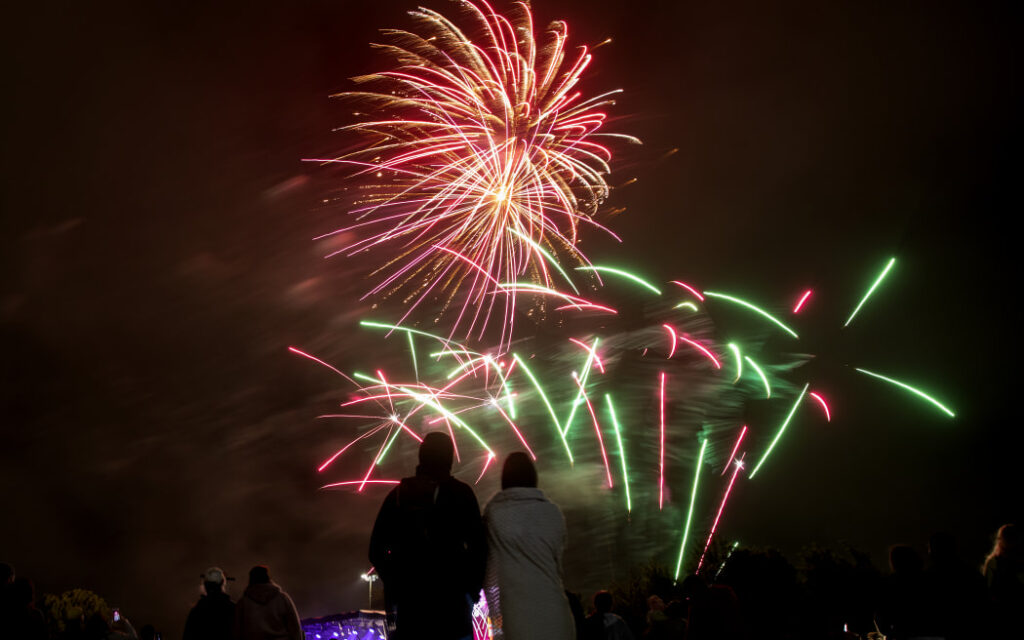 People watch fireworks during New Year's Eve celebrations in Christchurch on 1January 2021. 