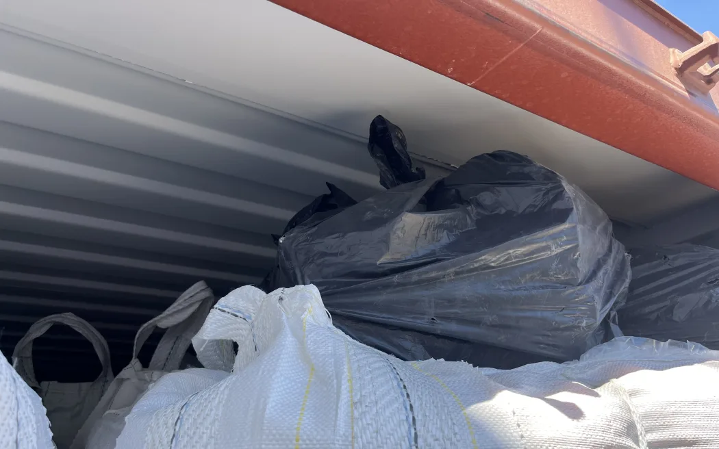 Cocaine was located in these bags, on top of legitimate product