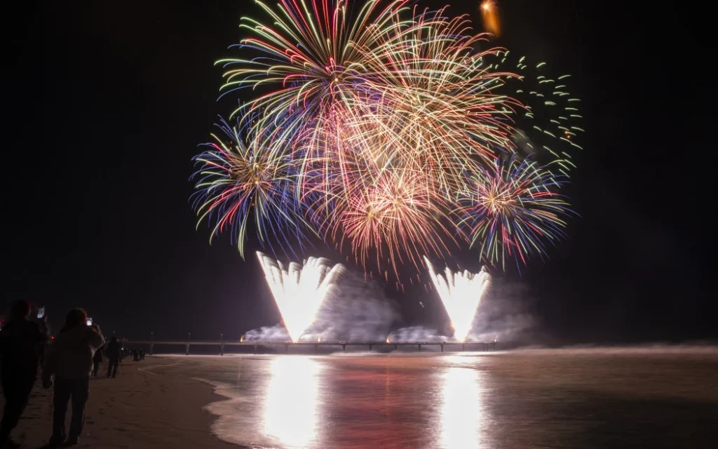 Fireworks illuminate the sky above the New Brighton Pier during Christchurch's first-ever Matariki fireworks spectacular in Christchurch, New Zealand on July 10, 2021. The Matariki is an annual new year celebration of the Maori's, the indigenous people of New Zealand. (Photo by Sanka Vidanagama/NurPhoto) (Photo by SANKA VIDANAGAMA / NurPhoto via AFP)