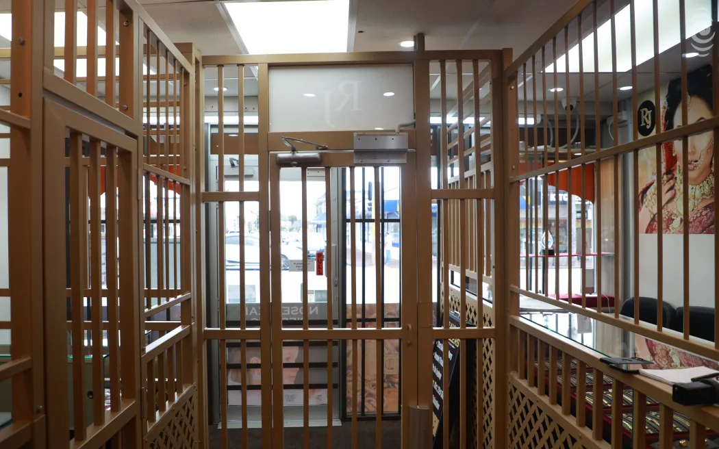 Many shops have installed impregnable metal security doors at their entrances and thick metal bars inside windows in Papatoetoe.