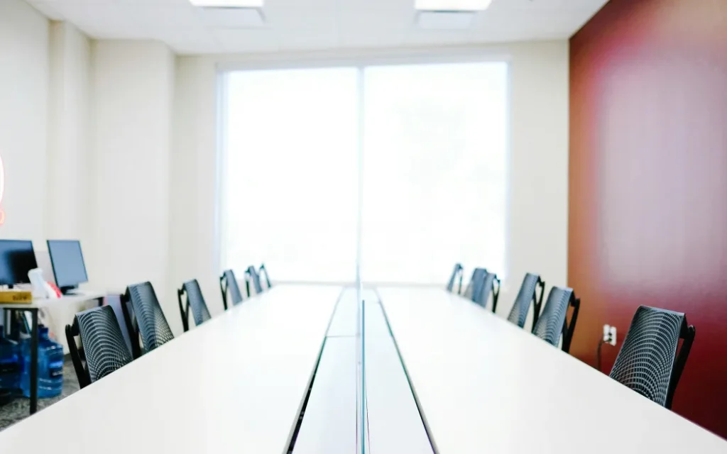 Empty chairs in an office meeting room.