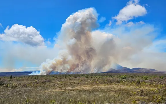 Smoke fills the sky above the Tongariro National Park where a wildfire has been raging since Saturday evening